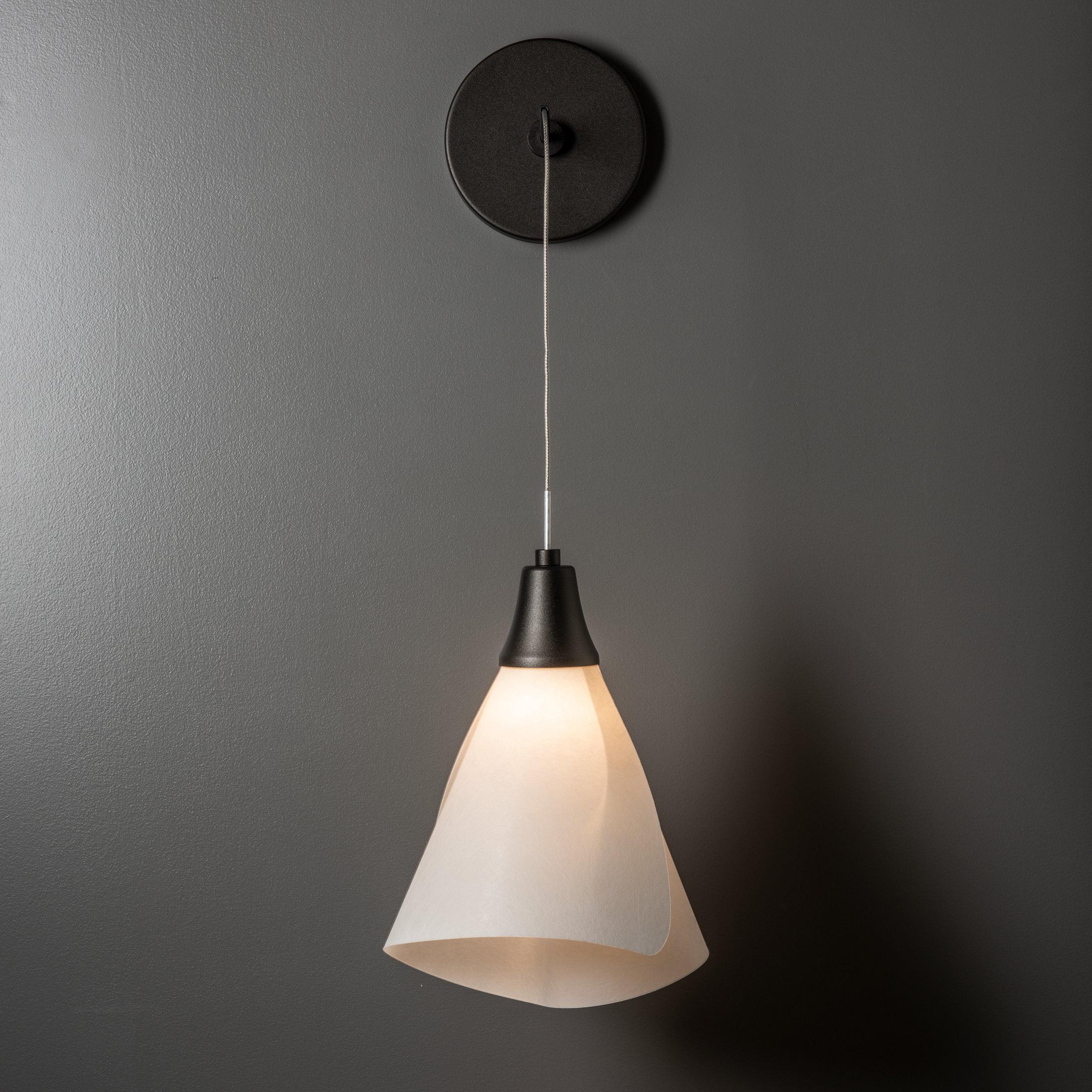 Low voltage outlet sconce